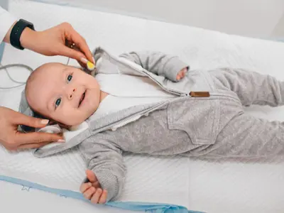 Baby undergoing hearing screening test